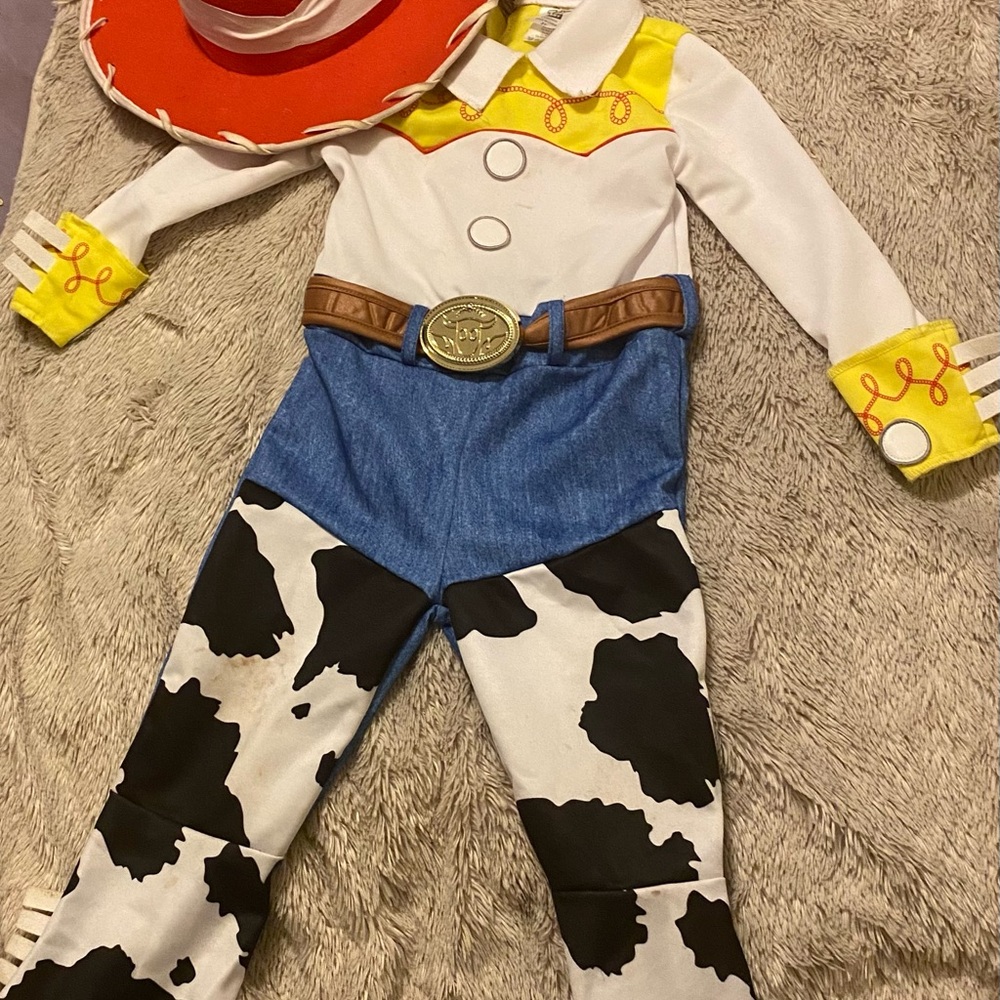 Jessie from Toy story costume with hat. Size 2T. Brand is Spirit Halloween.